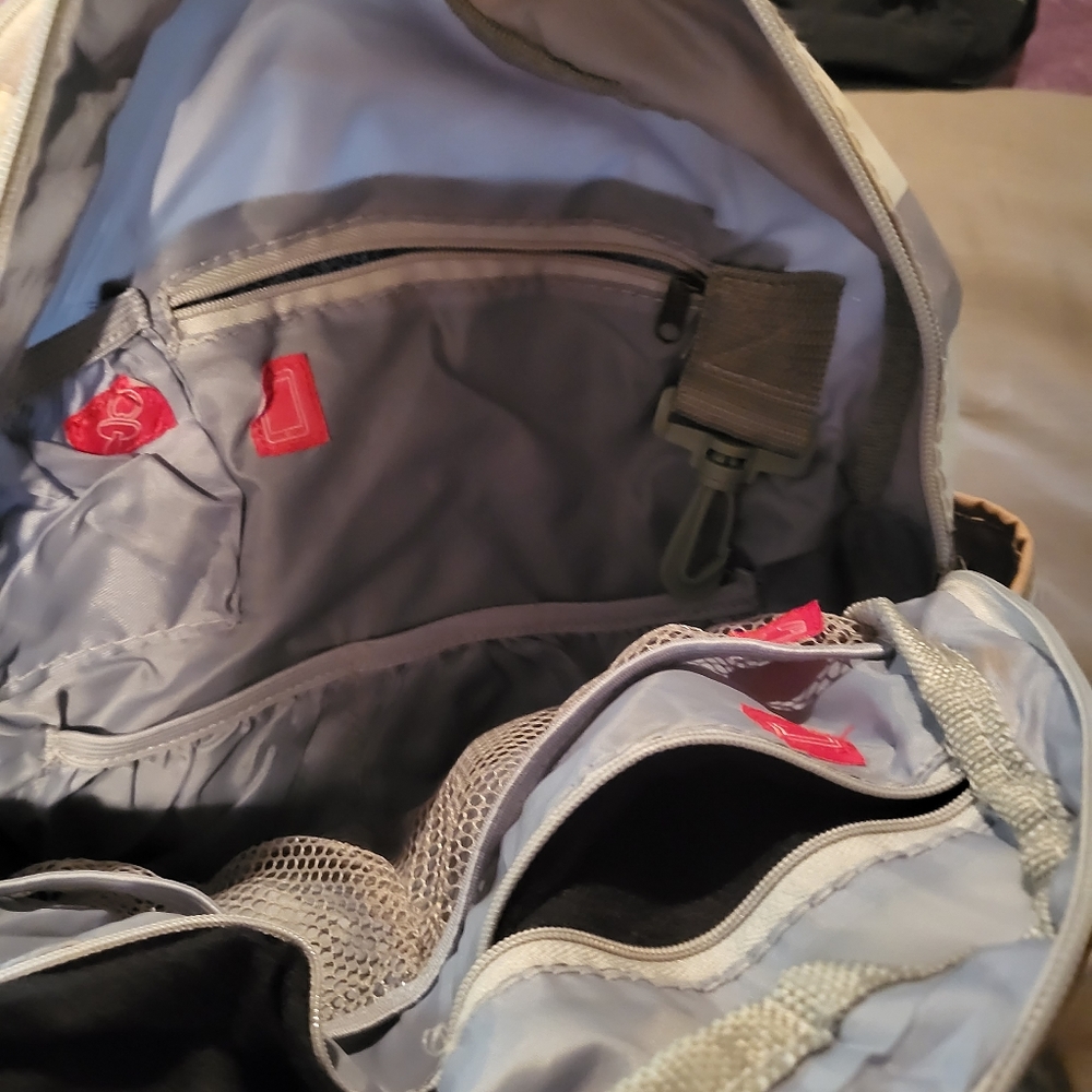 This is actually a diaper bag has 12 pockets